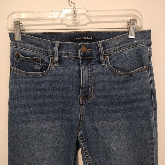 Calvin Klein - Distressed Mid Rise Skinny Jeans - Picture 3 of 15